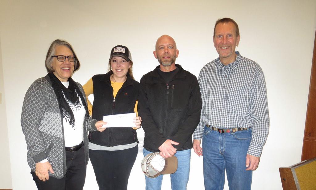 Waymarks Plymouth Church Helena Montana May 2018 Moderator Pat Chris an and Pastor Roger Lynn presen ng check to Desiree Baine and Rich Ridgeway for the Willis Cruse House. Photo by Jennifer Thompson.