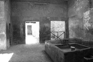 1. Pompeii in 79 AD The picture below shows a laundry in Pompeii.