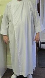 Cassock-Alb A long white robe shaped like a cassock worn by the priest, deacon, and chalice bearer at services of Holy Eucharist.