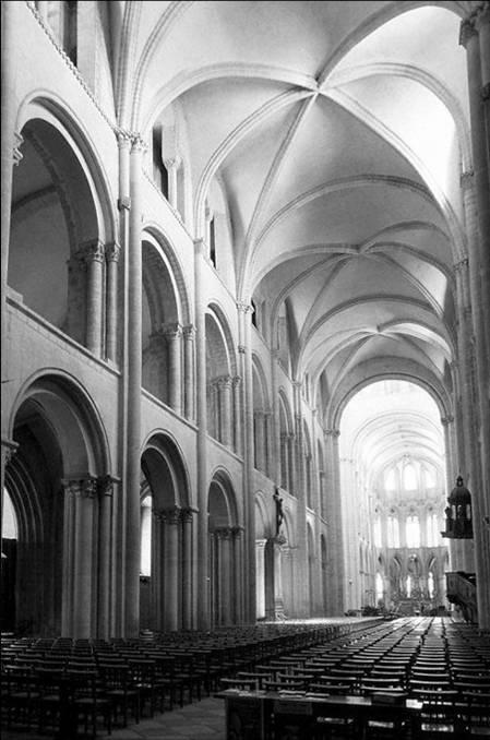 The use of these groin vaults gave the interior a more spacious feel, and allowed for the addition of large windowed arches in the third story.