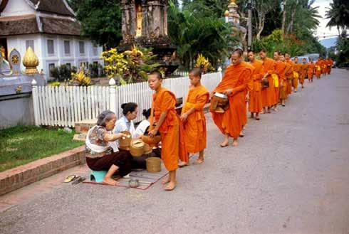 Arms giving in Luang Prabang,