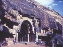 The cave consists of an open courtyard with two pillars, a stone screen wall to protect from rain, a veranda, a stone-screen wall as facade, an apsidal vault-roof chaitya hall with pillars, and a