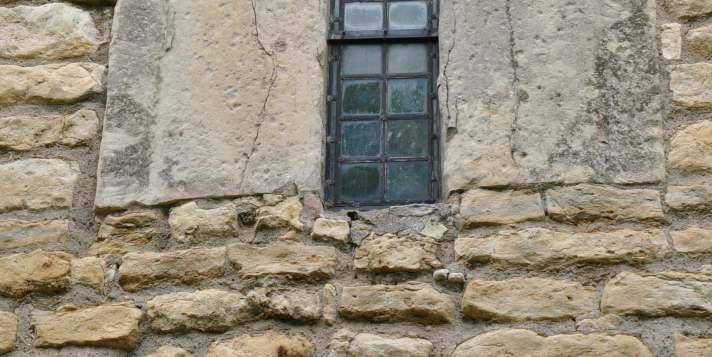 Belfry window Nth, (one of four). Note triangular heads and with surrounding strip-work enriched with billet ornament.
