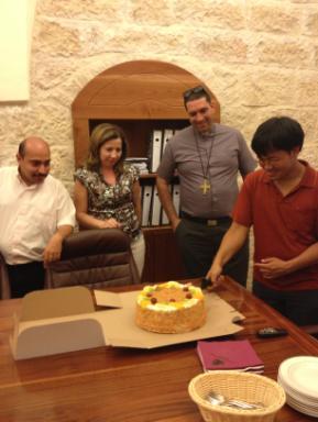 Bishop Suheil Shares Birthday Cake with Justin Cheng Bishop Suheil shares birthday cake with Justin Cheng, an ordinand from the Diocese of British Columbia, and said