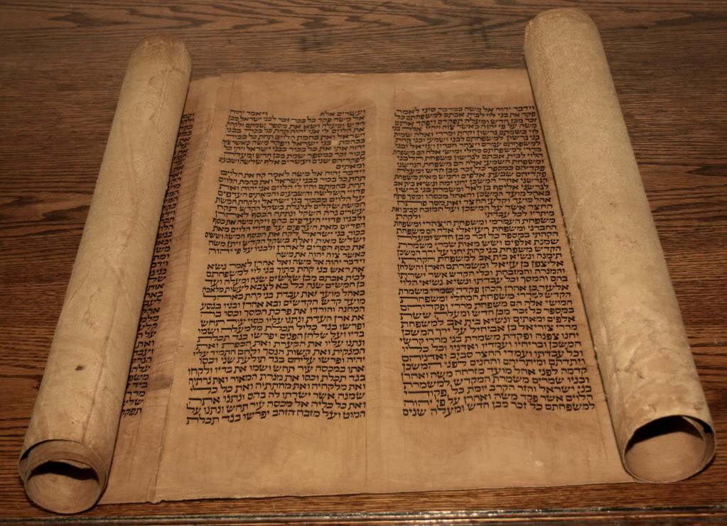 24 A Hebrew scroll containing the Book of Numbers. It was handwritten on deerskin parchment in about 1700.