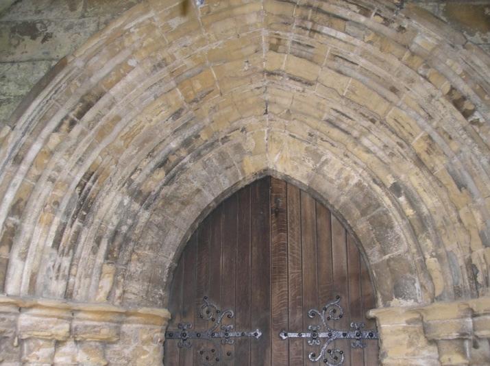 Internally the south door is encompassed in a pointed arch that has chamfered