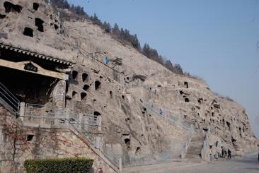 LONGMEN CAVES! Luoyang, China! Tang Dynasty 493-1127 CE! Limestone cliffs! Place of worship for the Buddhist religion!