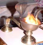 Aarti Aarti is the beautiful ceremony in which dias (the oil lamps) are offered to God.