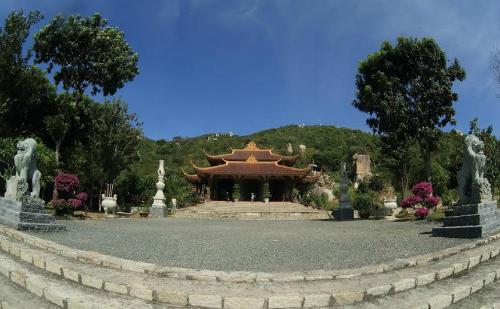 hall far away, entrance tourts amonastery peaceful hall located have midway to such climb on a altitude high slope.