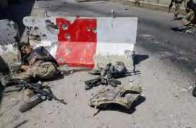 Left: The body of an ISIS operative with assault rifles and vests lying in front of him (Haqq, June 1, 2018) On May 31, 2018, ISIS s Khorasan Province announced that a squad of 10 ISIS operatives