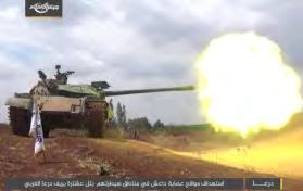 6 Right: Jaysh Al-Islam tank attacking positions of the Khaled bin Al-Walid Army in Tell Ashtara, north of Daraa.