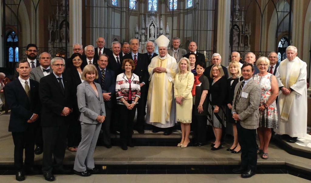 A group photo taken at the Church of St. John of Creighton University in Omaha during the annual meeting of the North American Lieutenants.