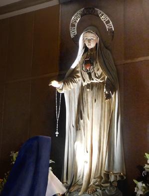 We knelt by her little bed, touched our rosaries to the chair where Our Lady sat when she came to visit her, and knelt at the window overlooking the chapel where she would sit and