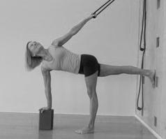 ing to balance the hips as you lengthen and revolve the spine. 7. To come out of the pose, bend the right leg, extend back with the left leg and take the left foot to the floor.