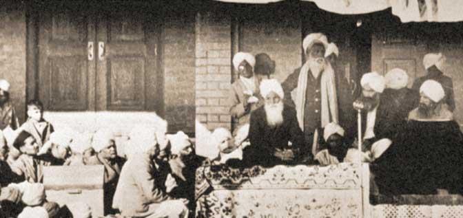 -26- Kirpal Singh, sitting on the dais with Hazur Baba Sawan Singh, is giving satsang There was a great conspiracy.