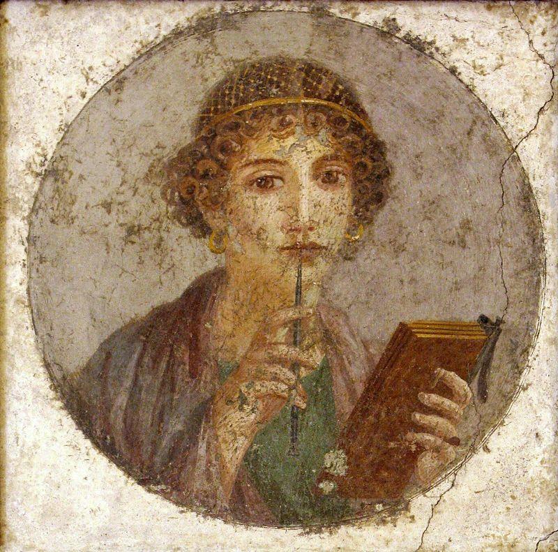 Dionysus, the god of grapes and wine. This festival celebrated the renewal of the grape vines. On stage, actors could play several roles by wearing different masks.