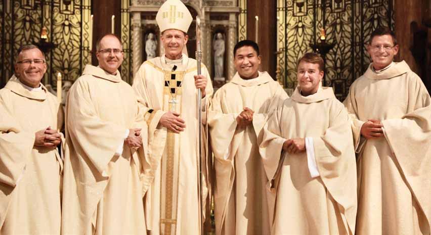 The five are part of a larger group of 16 men ordained as Jesuit priests in the U.S. this summer. Bishop John C. Wester of Salt Lake City was the chief celebrant for the Mass.