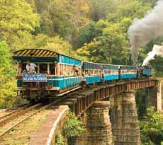 1 15 Top Experiences 2 15 Top Experiences Mettupalayam as the train snakes over bridges, goes through small tunnels, and chugs past small and picturesque stations.