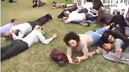 Right: Israeli civilians lie on the ground after mortar shell fire during an event to mark the birthday of fallen Israeli soldier Oron Shaul (YouTube, December 29 2017).
