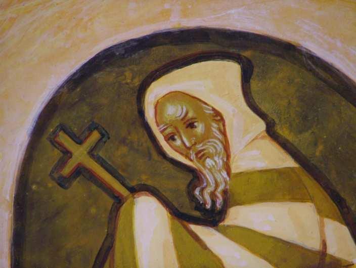 The image of hermits in caves doing various tasks is derived from Byzantine icons of the Death of Saint Ephraim.