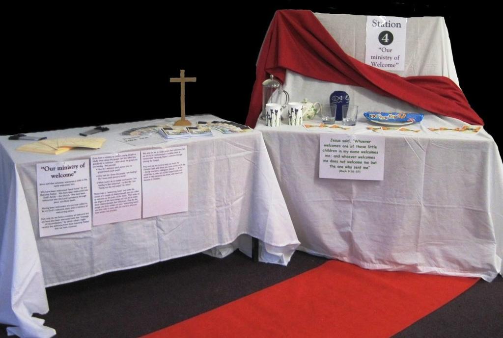 10 Station 4: Our Ministry of Welcome. Items Needed: Two large tables covered with white material (eg sheets) A display board covered in white material, with a red sheet draped over it.