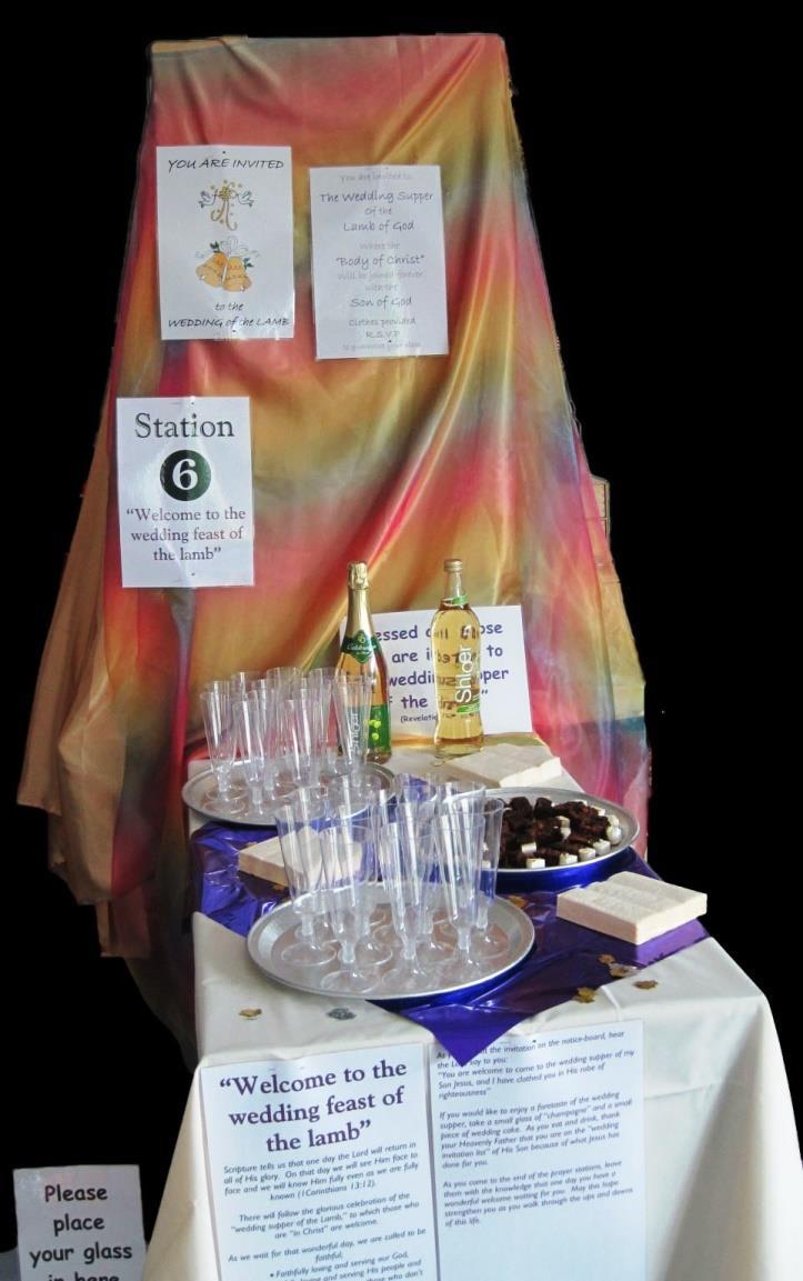 15 Station 6: Welcome to the wedding feast of the lamb Items Needed: A large table covered with a cream table-cloth on top of which is a piece of purple shiny metallic wrapping paper 32 A display