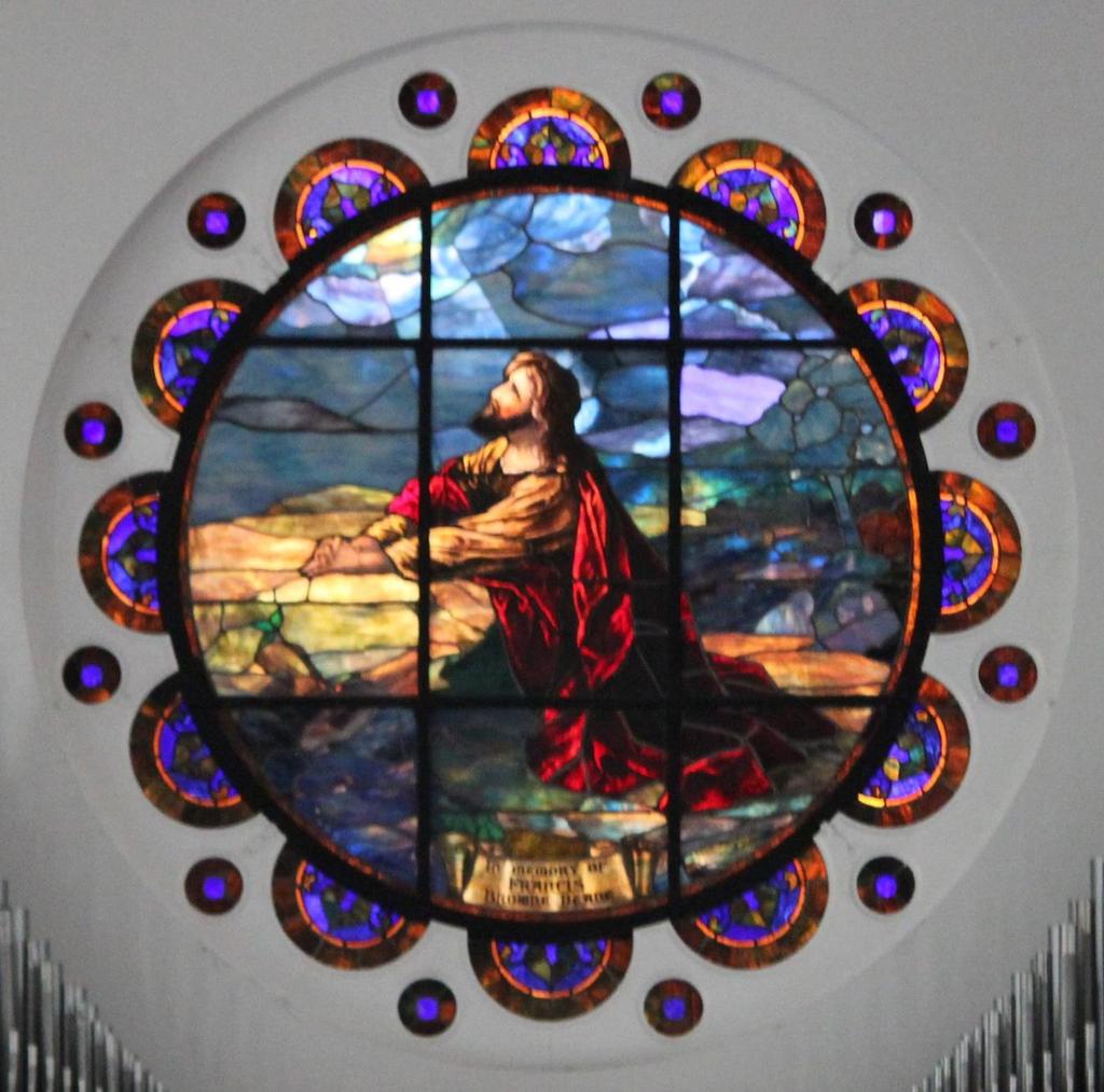 (Back Wall over Organ Pipes) Christ in the Garden of Gethsemane Matthew 26:39 This window is one of the many windows brought from the former church at