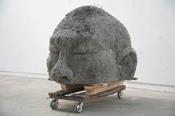 Zhang Huan -- a massive head made of incense ash and steel.