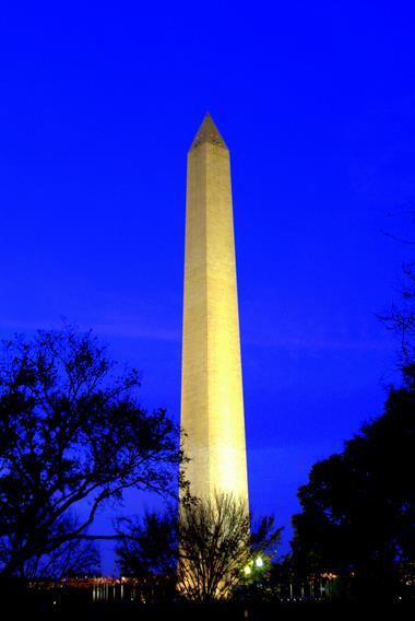 Washington Monument By Night By: Carl Sandburg The stone goes straight. A lean swimmer dives into night sky, Into half-moon mist. Two trees are coal black. This is a great white ghost between.