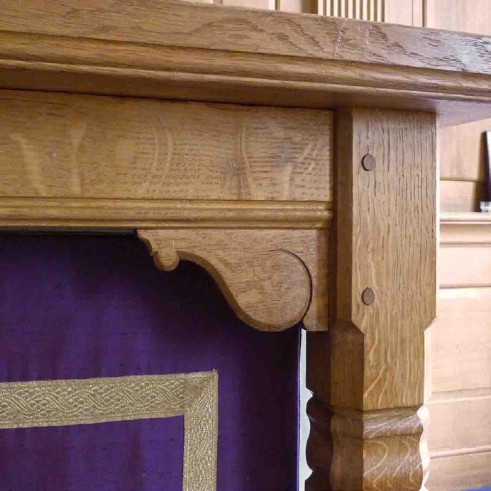 The firm of Robert Mouseman Thompson, who had supplied the tables for the great hall, made the pews and tables. Two of Thompson s signature mice can be found masquerading as scrollwork on the altar.