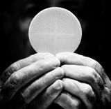 You will always be visited by a priest first to be anointed and receive the sacraments.