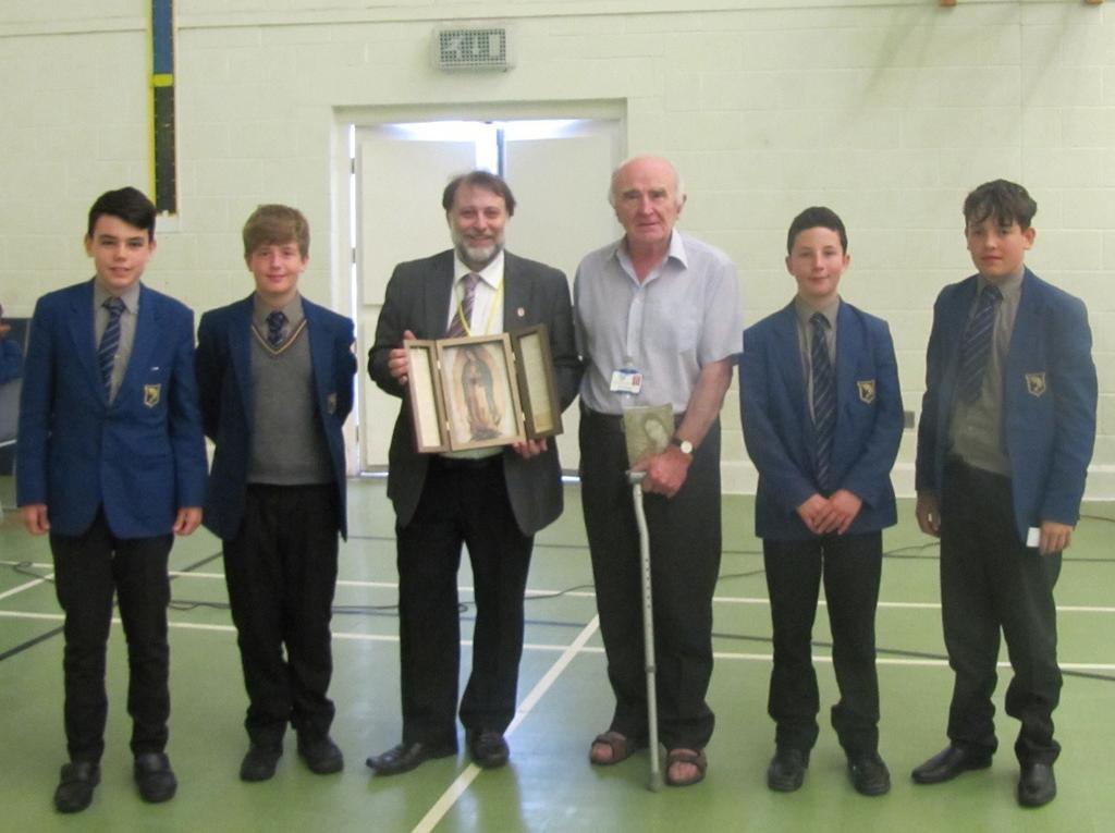 Guardian Michael presents the School Faith Group and their leader, Mr Walsh, with a Pilgrim Queen Home
