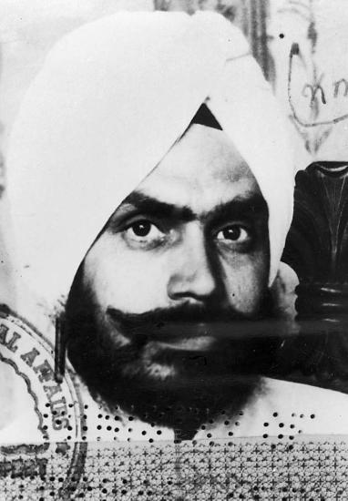 A passport photograph of a young Giani Gurdit Singh who always wanted to explore new vistas and visit