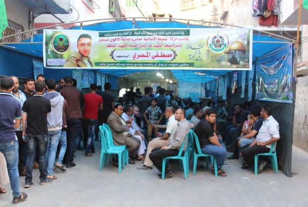 Left: Hamas banner at the entrance to the mourning tent erected for Mustafa al-masri (Facebook page of Sharq Press, May 15, 2018) Ahmad Fayiz