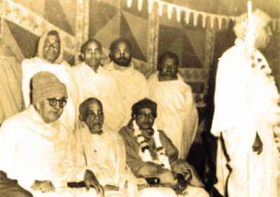 The first annual function of Shri Indraprastha Gaudiya Temple (1964) Standing and speaking this lecture: Shri Shrimad Bhaktivedanta Narayan Maharaj, sitting on the