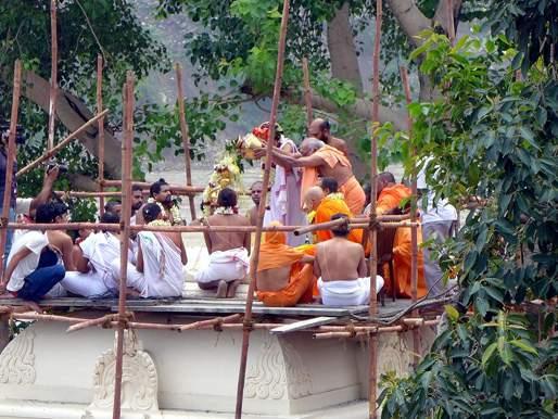 Priests carry Gangajal for