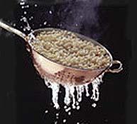 Strainers/colanders A person might use a strainer to drain water from cooked pasta or vegetables.