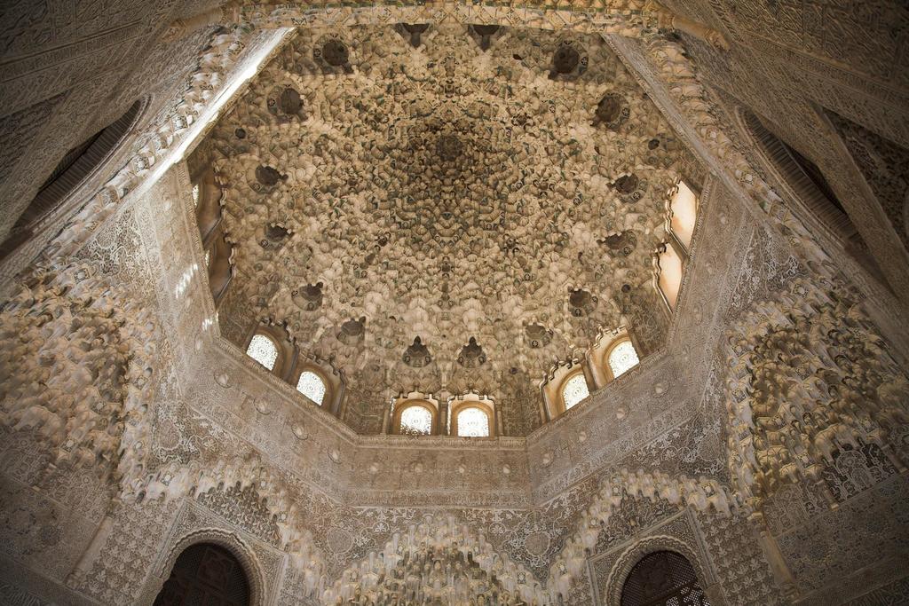 Muqarnas Ceiling Muqarnas derived its name from Arabic ﻣﻘرﻧص, meaning stalactite vaults The construction of Muqarnas uses a system of complex