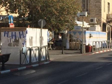 Prayer Update From Israel (October 13, 2014) Sukkas outside restaurants in Jerusalem, in which customers may eat their meals.