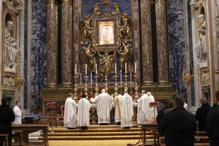 James Cardinal Harvey celebrates Mass with the