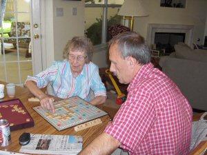 Top left: Harriet and Rodger playing Scrabble, her