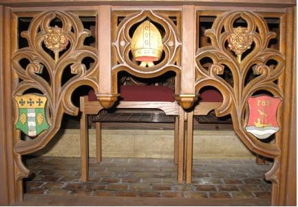 Guide to the images on the choir desks Starting on the left or font side of the front row of desks facing east, the first panel is decorated with a Bishop s mitre and the arms of the Dioceses of