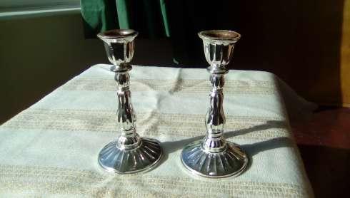 Kiddush candle sticks (ki-doosh) Challah cover (ha-lah) To hold the candles which are lit every Friday evening to welcome the sabbath.