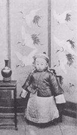 1912 February 12: Pu-yi had been three years old when he had become emperor, with his father serving as regent.