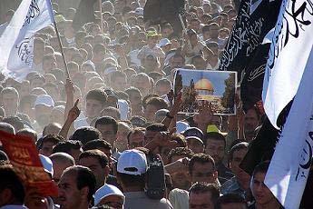 The sign at the lower right reads The Caliphate one nation one state one ruler (From www.hizb-ut-tahrir.org). 4.
