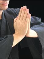 The eyes are focused on the tips of the middle fingers. The formal Gassho helps establish a reverential, alert attitude. This gesture is used to show reverence.