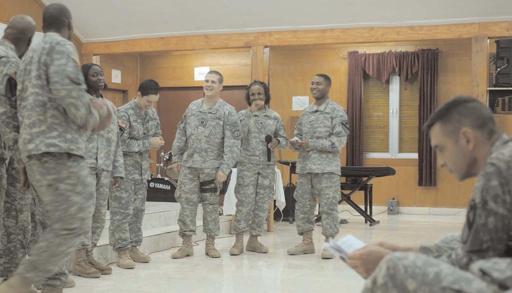 Page 4 Soldiers perform a skit teaching tolerance for all races and religions during the celebration of Dr. Martin Luther King Jr.