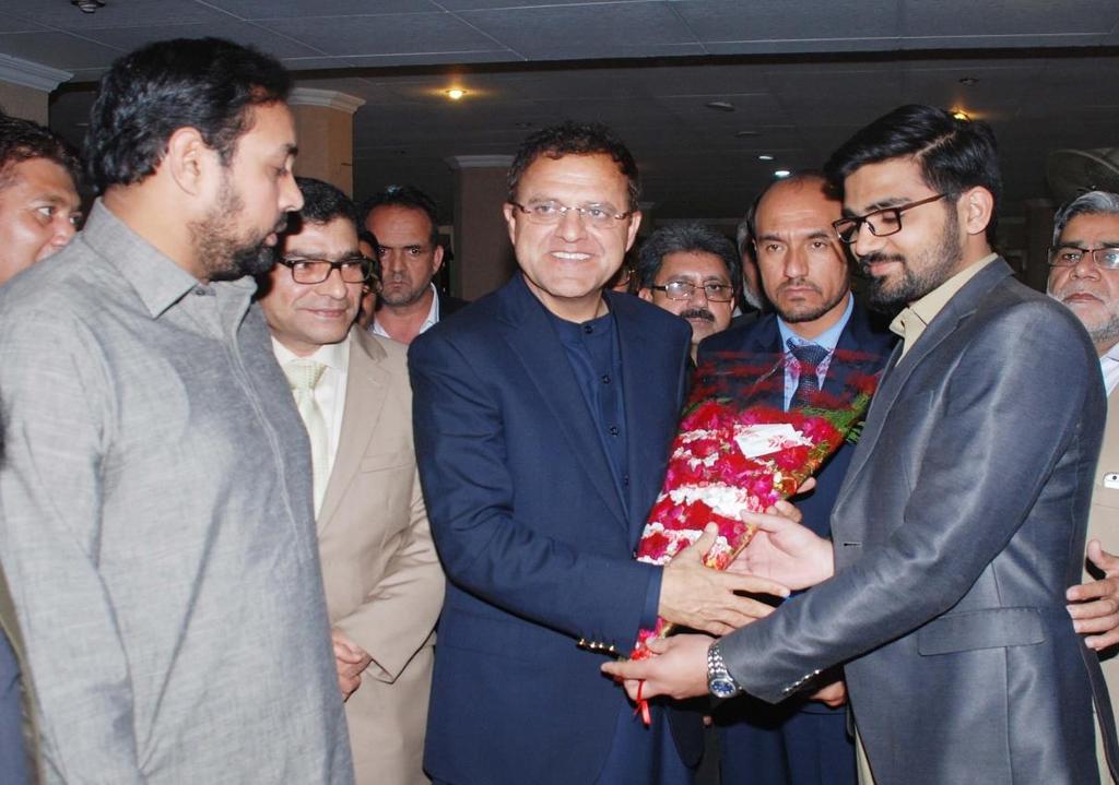 Mr. Syed Ali Faisal Member Livestock Exporters Association of Pakistan and Executive Committee Member of FPCCI presenting Bouquet to H.E Mr.