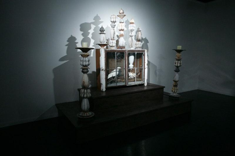 The altar is topped with several spires constructed of ceramics parts.