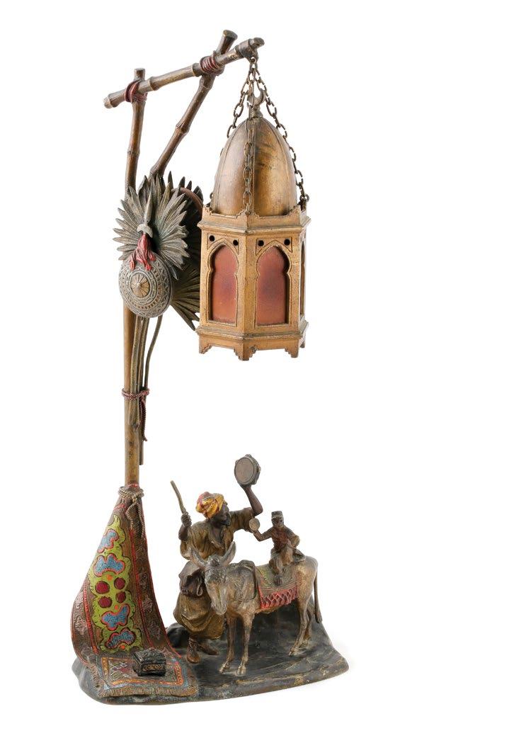 Anton Chotka (Austrian1875-1925) Cold-painted bronze lamp with figural group of a man with a monkey riding a donkey.